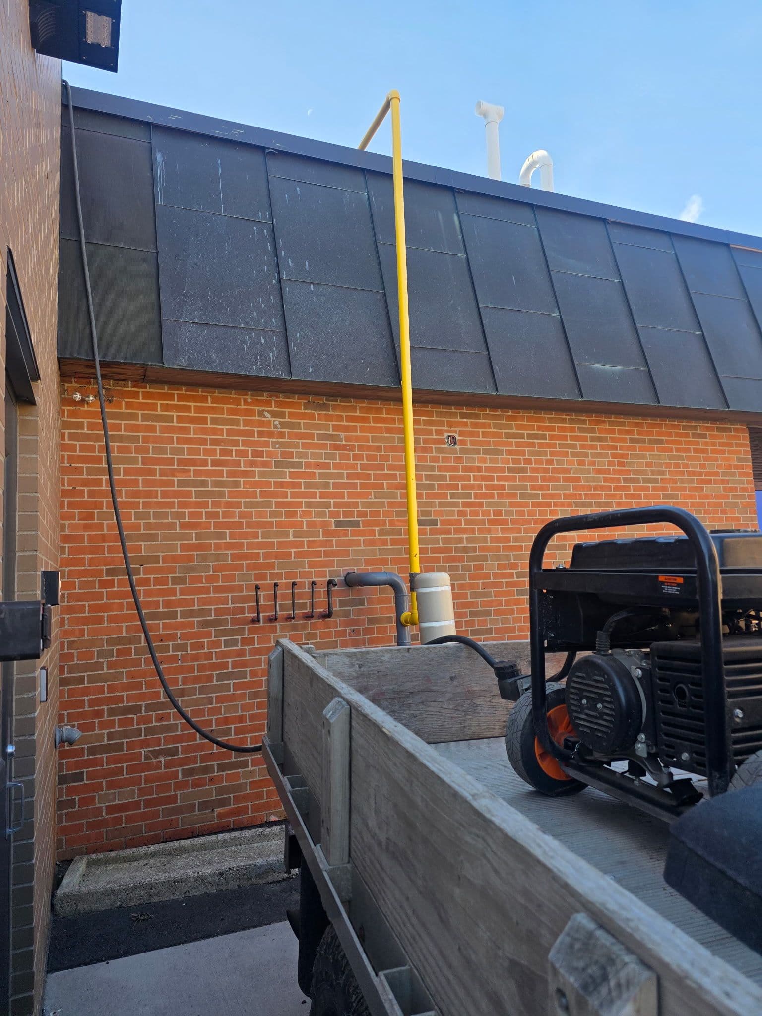 Gallery photos for Roof Access Ladder Repair at MACCRAY High School in Clara City: Image #5