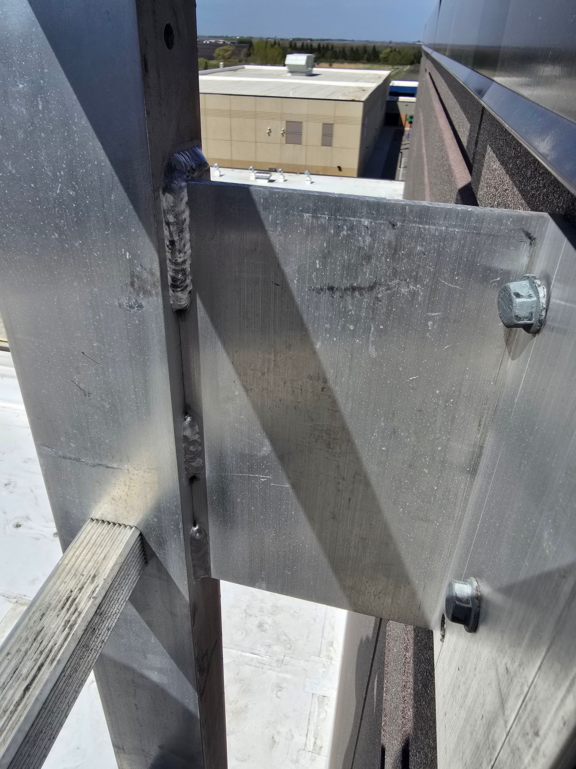 Gallery photos for Roof Access Ladder Repair at MACCRAY High School in Clara City: Image #2
