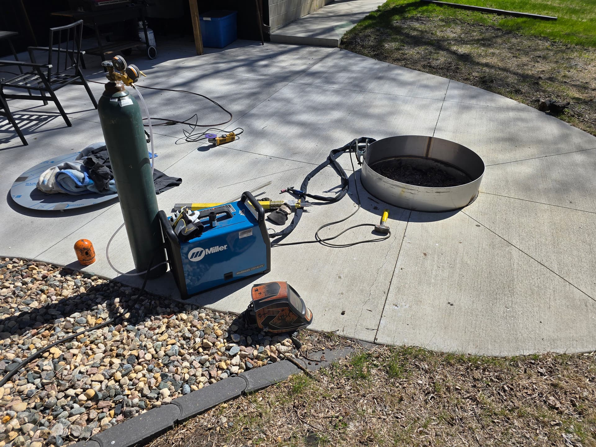 Gallery photos for Stainless Fire Pit Riser and Cover Fix in Willmar: Image #1